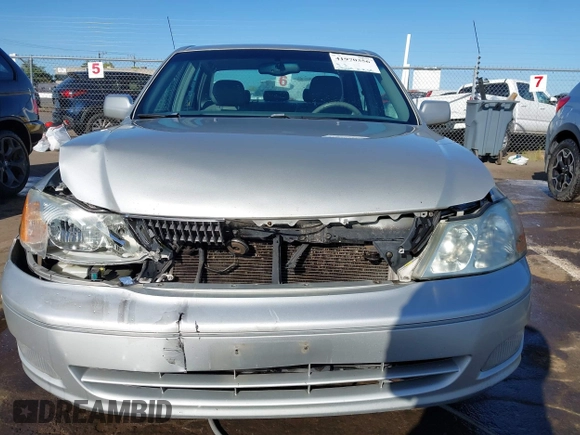 2001 Toyota Avalon XL z VIN 4T1BF28B51U189775, wystawiony jako IAAI lot #41970356 z przebiegiem 247 969 mil mil oraz . Historia ofert i sprzedaży dostępna na DreamBid. Obrazek 6.