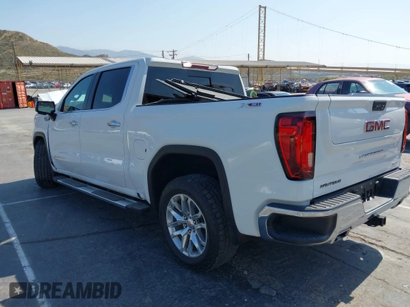 2022 GMC Sierra 1500 SLT with VIN 3GTU9DED3NG156904, listed as a IAAI auction lot 42429722 with 59,717 mi miles and . Bid and sale history available at DreamBid. Image 3.