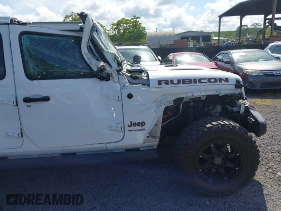 2022 Jeep Wrangler Unlimited Rubicon with VIN 1C4HJXFG8NW130156, listed as a IAAI auction lot 42004630 with 129,313 mi miles and . Bid and sale history available at DreamBid. Image 17.