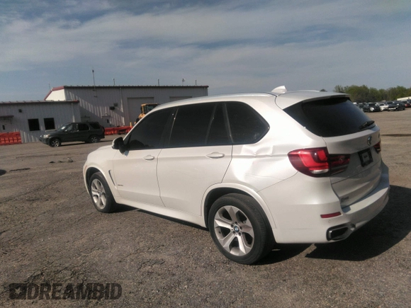 2014 BMW X5 xDrive35i with VIN 5UXKR0C56E0H18800, listed as a IAAI auction lot 40843200 with 129,991 mi miles. Bid and sale history available at carsss.com. Image 3.