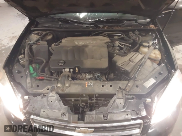 2013 Chevrolet Impala LS with VIN 2G1WF5E38D1130975, listed as a IAAI auction lot 41260029 with 64,068 mi miles and . Bid and sale history available at DreamBid. Image 10.