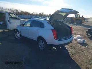 2012 Cadillac SRX Luxury Collection z VIN 3GYFNAE37CS576292, wystawiony jako IAAI lot #41048054 z przebiegiem 158 948 mil mil oraz . Historia ofert i sprzedaży dostępna na DreamBid. Obrazek 3.