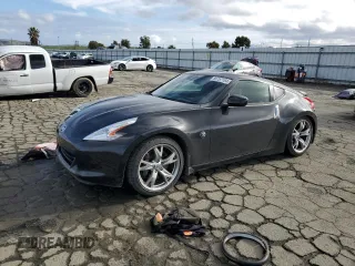 2010 Nissan 370Z with VIN JN1AZ4EHXAM506643, listed as a Copart auction lot 86757104 with 70,618 mi miles and Salvage Title. Bid and sale history available at carsss.com. Image 1.