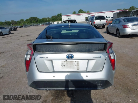 2017 Toyota Prius Two z VIN JTDKARFU8H3046058, wystawiony jako IAAI lot #42169692 z przebiegiem 79 226 mil mil oraz . Historia ofert i sprzedaży dostępna na DreamBid. Obrazek 17.