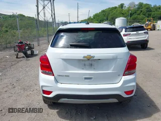 2020 Chevrolet Trax LT with VIN KL7CJPSB5LB002799, listed as a IAAI auction lot 42247119 with 92,459 mi miles and . Bid and sale history available at DreamBid. Image 16.