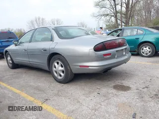 1995 Oldsmobile Aurora with VIN 1G3GR52C2S4100055, listed as a IAAI auction lot 41918157 with 106,329 mi miles and . Bid and sale history available at DreamBid. Image 3.