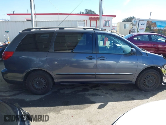 2006 Toyota Sienna CE with VIN 5TDZA23C26S540252, listed as a IAAI auction lot 41877613 with 122,857 mi miles and . Bid and sale history available at DreamBid. Image 14.