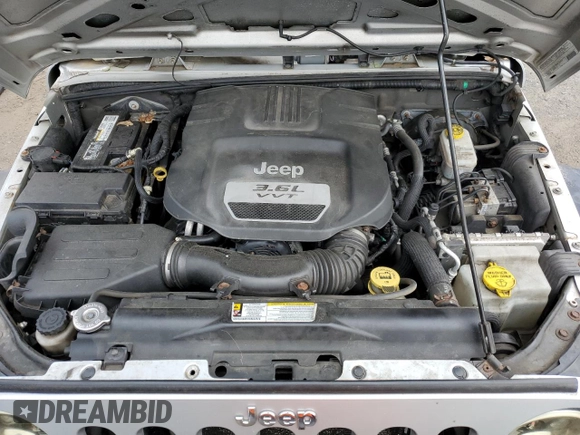2012 Jeep Wrangler Sport с VIN 1C4AJWAG9CL157805, выставлен на аукционе Copart как лот 65205905 с пробегом 249 221 миль миль и Чистый • Clean title. История ставок и продаж доступна на DreamBid. Изображение 11.