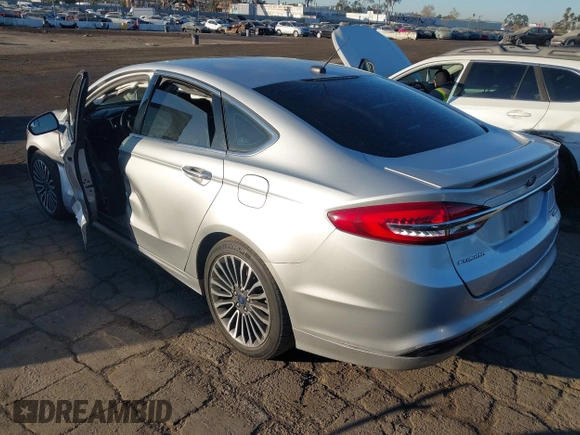 2017 Ford Fusion Hybrid Titanium with VIN 3FA6P0RU8HR190482, listed as a IAAI auction lot 41322244 with 137,539 mi miles and . Bid and sale history available at DreamBid. Image 3.