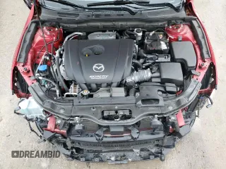 2018 Mazda 3 Touring z VIN 3MZBN1L39JM260754, wystawiony jako Copart lot #58514675 z przebiegiem 62 946 mil mil oraz Czysty tytuł • Clean title. Historia ofert i sprzedaży dostępna na DreamBid. Obrazek 12.