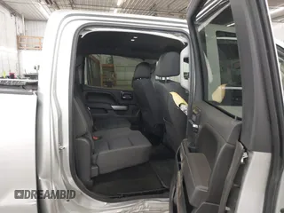 2017 Chevrolet Silverado 1500 LT with VIN 3GCUKREC5HG318772, listed as a IAAI auction lot 42056116 with 82,987 mi miles and . Bid and sale history available at DreamBid. Image 8.