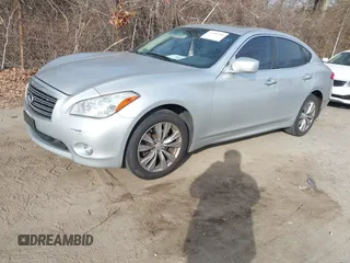 2013 Infiniti M z VIN JN1BY1AR0DM600278, wystawiony jako IAAI lot #41303485 z przebiegiem 298 943 mil mil oraz . Historia ofert i sprzedaży dostępna na DreamBid. Obrazek 17.