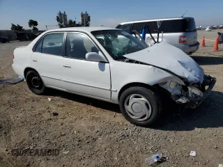 1998 Toyota Corolla VE with VIN 1NXBR18EXWZ081316, listed as a Copart auction lot 58938535 with 222,122 mi miles and Salvage title. Bid and sale history available at DreamBid. Image 4.