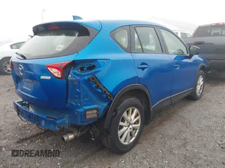 2013 Mazda CX-5 Sport with VIN JM3KE4BE9D0157890, listed as a IAAI auction lot 40998406 with 134,087 mi miles. Bid and sale history available at carsss.com. Image 4.