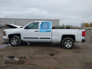 2014 Chevrolet Silverado 1500 LT with VIN 1GCVKREC2EZ390061, listed as a IAAI auction lot 40824477 with 140,928 mi miles and . Bid and sale history available at DreamBid. Image 14.