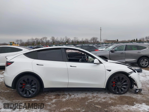 2021 Tesla Model Y Performance with VIN 5YJYGDEF6MF261711, listed as a IAAI auction lot 41176208 with 25,687 mi miles and . Bid and sale history available at DreamBid. Image 13.