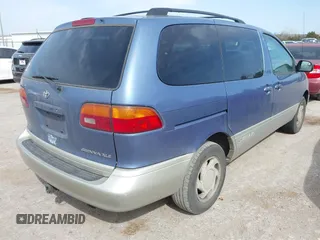 1999 Toyota Sienna LE with VIN 4T3ZF13C2XU147508, listed as a IAAI auction lot 41833859 with 275,682 mi miles. Bid and sale history available at carsss.com. Image 4.