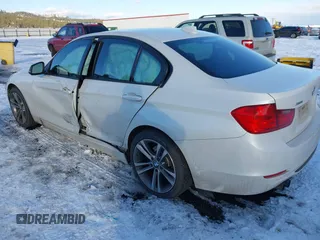 2014 BMW 3 Series 328i xDrive with VIN WBA3B3C55EJ978766, listed as a IAAI auction lot 41535194 with 110,387 mi miles. Bid and sale history available at carsss.com. Image 3.