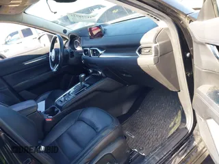2018 Mazda CX-5 Grand Touring with VIN JM3KFBDM5J0441518, listed as a IAAI auction lot 41748941 with 64,639 mi miles. Bid and sale history available at carsss.com. Image 5.