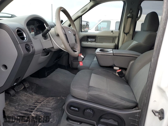 2007 Ford F-150 XLT with VIN 1FTRW14W47KC40614, listed as a Copart auction lot 42415565 with 295,398 mi miles and Salvage title. Bid and sale history available at DreamBid. Image 7.