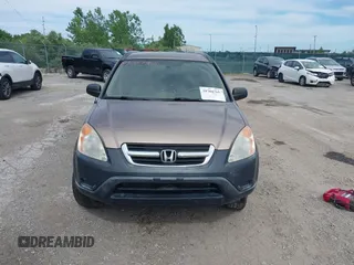2004 Honda CR-V LX with VIN JHLRD784X4C015401, listed as a IAAI auction lot 39704765 with 158,987 mi miles and . Bid and sale history available at carsss.com. Image 12.