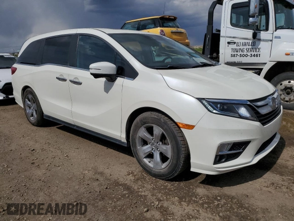2018 Honda Odyssey EX-L z VIN 5FNRL6H68JB508942, wystawiony jako Copart lot #57323725 z przebiegiem 106 083 mil mil oraz Czysty tytuł • Clean title. Historia ofert i sprzedaży dostępna na DreamBid. Obrazek 4.