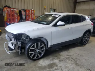 2018 BMW X2 sDrive28i with VIN WBXYJ3C37JEP76768, listed as a Copart auction lot 56840145 with 115,165 mi miles and Salvage title. Bid and sale history available at DreamBid. Image 1.