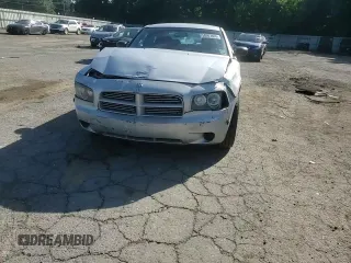 2006 Dodge Charger z VIN 2B3KA43G86H528185, wystawiony jako Copart lot #58007605 z przebiegiem 266 197 mil mil oraz Szkoda całkowita • Salvage title. Historia ofert i sprzedaży dostępna na DreamBid. Obrazek 13.