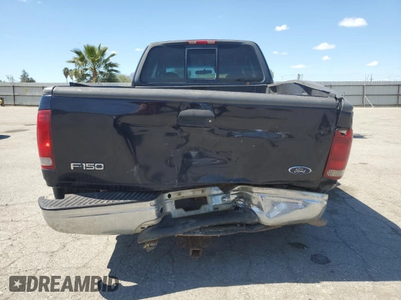 2000 Ford F-150 XL with VIN 1FTRX17L0YKA29295, listed as a Copart auction lot 50719525 with 0 mi miles and Salvage Title. Bid and sale history available at carsss.com. Image 6.