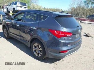 2014 Hyundai Santa Fe z VIN 5XYZUDLB1EG165458, wystawiony jako IAAI lot #42107789 z przebiegiem 94 395 mil mil oraz . Historia ofert i sprzedaży dostępna na DreamBid. Obrazek 3.