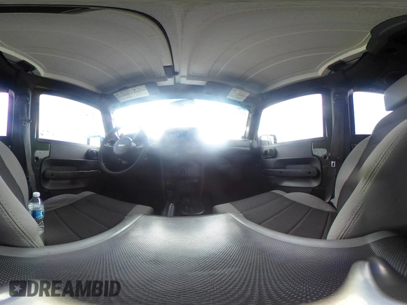 2007 Jeep Wrangler Unlimited X with VIN 1J4GA39127L231378, listed as a IAAI auction lot 42252475 with 152,568 mi miles and . Bid and sale history available at DreamBid. Image 19.