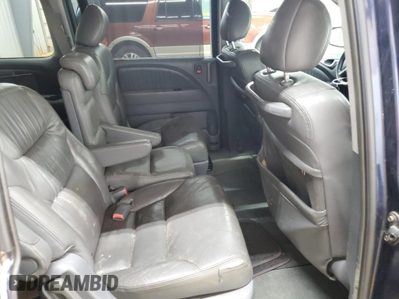 2005 Honda Odyssey EX-L with VIN 5FNRL38785B054186, listed as a Copart auction lot 58072125 with 219,928 mi miles and Salvage title. Bid and sale history available at DreamBid. Image 11.