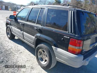 1996 Jeep Grand Cherokee Laredo with VIN 1J4GZ58S3TC345107, listed as a IAAI auction lot 41661884 with 179,175 mi miles. Bid and sale history available at carsss.com. Image 3.