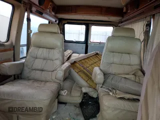 1995 Chevrolet Chevy Van z VIN 1GBEG25K8SF209126, wystawiony jako Copart lot #86254464 z przebiegiem 161 683 mil mil oraz Czysty tytuł • Clean title. Historia ofert i sprzedaży dostępna na DreamBid. Obrazek 10.
