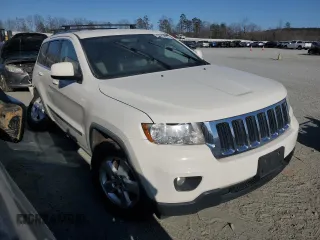 2012 Jeep Grand Cherokee Laredo with VIN 1C4RJFAG0CC201435, listed as a Copart auction lot 47026885 with 205,603 mi miles and Salvage Title. Bid and sale history available at carsss.com. Image 4.