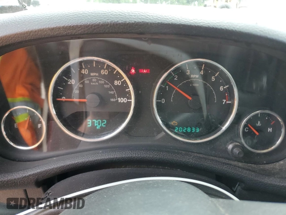 2012 Jeep Wrangler Sport with VIN 1C4AJWAGXCL173771, listed as a Copart auction lot 60336455 with 202,833 mi miles and Clean title. Bid and sale history available at DreamBid. Image 9.