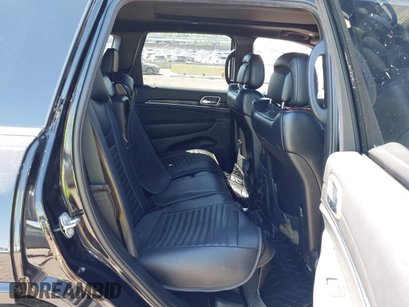 2017 Jeep Grand Cherokee Overland with VIN 1C4RJFCG0HC844713, listed as a IAAI auction lot 42293301 with 83,791 mi miles and . Bid and sale history available at DreamBid. Image 8.