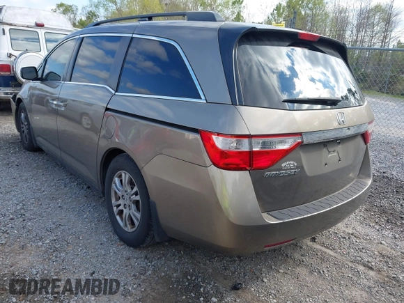 2013 Honda Odyssey EX z VIN 5FNRL5H40DB038886, wystawiony jako IAAI lot #41761738 z przebiegiem 244 107 mil mil oraz . Historia ofert i sprzedaży dostępna na DreamBid. Obrazek 3.