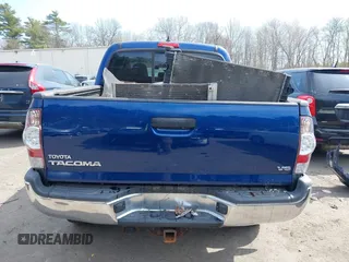 2014 Toyota Tacoma with VIN 3TMLU4EN0EM153558, listed as a IAAI auction lot 41964890 with 140,864 mi miles and . Bid and sale history available at DreamBid. Image 17.