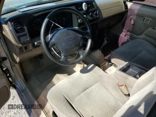 2000 Nissan Frontier XE with VIN 1N6DD26S7YC430643, listed as a Copart auction lot 59386765 with 204,851 mi miles and Salvage title. Bid and sale history available at DreamBid. Image 8.