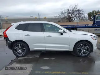 2018 Volvo XC60 Momentum z VIN YV4102RK6J1008472, wystawiony jako IAAI lot #41789008 z przebiegiem 64 123 mil mil oraz . Historia ofert i sprzedaży dostępna na DreamBid. Obrazek 13.