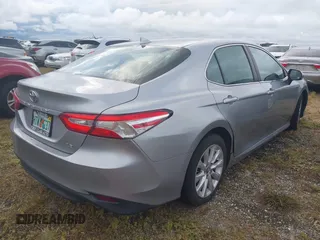 2020 Toyota Camry LE with VIN 4T1C11AK8LU939793, listed as a IAAI auction lot 40523304 with Not Provided miles and . Bid and sale history available at DreamBid. Image 4.