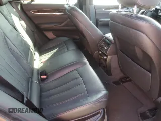 2018 BMW X6 sDrive35i z VIN 5UXKU0C54J0G69704, wystawiony jako Copart lot #57335475 z przebiegiem 61 777 mil mil oraz Szkoda całkowita • Salvage title. Historia ofert i sprzedaży dostępna na DreamBid. Obrazek 11.
