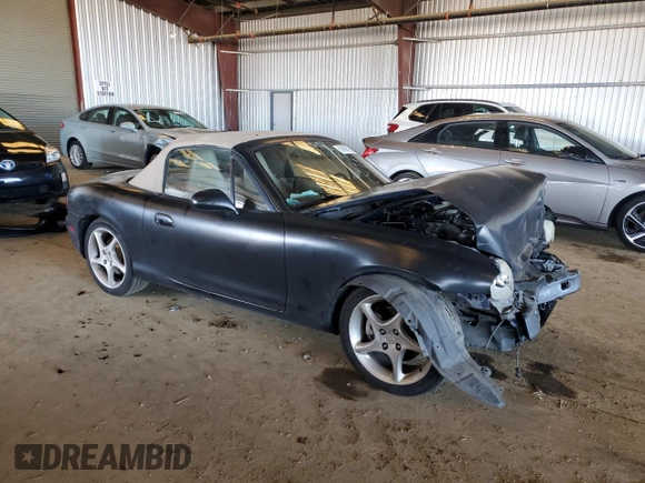 2003 Mazda MX-5 Miata Cloth with VIN JM1NB353730303334, listed as a Copart auction lot 51692615 with 142,789 mi miles and Salvage title. Bid and sale history available at DreamBid. Image 4.