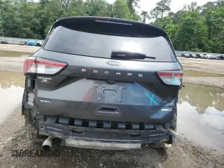 2020 Ford Escape SEL с VIN 1FMCU9H67LUA09835, выставлен на аукционе Copart как лот 58022875 с пробегом 99 341 миль миль и Списание • Salvage title. История ставок и продаж доступна на DreamBid. Изображение 6.