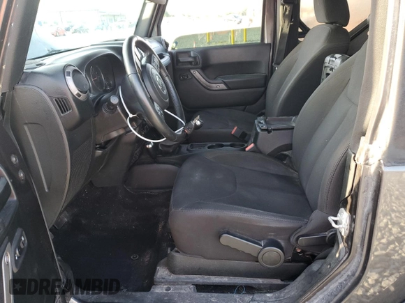 2018 Jeep Wrangler Willys Wheeler W z VIN 1C4AJWAGXJL852498, wystawiony jako Copart lot #52866945 z przebiegiem 90 515 mil mil oraz Szkoda całkowita • Salvage title. Historia ofert i sprzedaży dostępna na DreamBid. Obrazek 7.