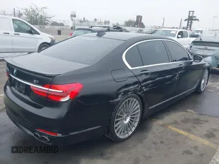2018 BMW 7 Series ALPINA B7 xDrive with VIN WBA7F2C5XJG856217, listed as a IAAI auction lot 41473030 with 49,298 mi miles. Bid and sale history available at carsss.com. Image 4.