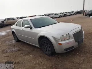 2006 Chrysler 300 Touring with VIN 2C3KA53G36H384442, listed as a IAAI auction lot 41817539 with 129,123 mi miles. Bid and sale history available at carsss.com. Image 13.