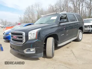 2015 GMC Yukon SLT z VIN 1GKS1BKCXFR192349, wystawiony jako IAAI lot #41842474 z przebiegiem 185 166 mil mil oraz . Historia ofert i sprzedaży dostępna na DreamBid. Obrazek 17.