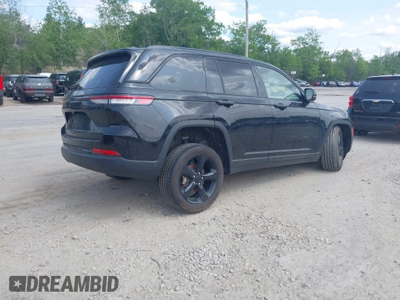 2023 Jeep Grand Cherokee Laredo with VIN 1C4RJHAG2PC660094, listed as a IAAI auction lot 42390290 with 27,802 mi miles and . Bid and sale history available at DreamBid. Image 4.